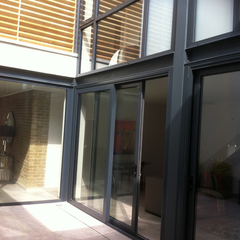Anthracite aluminium sliding patio doors fitted in Grove Park